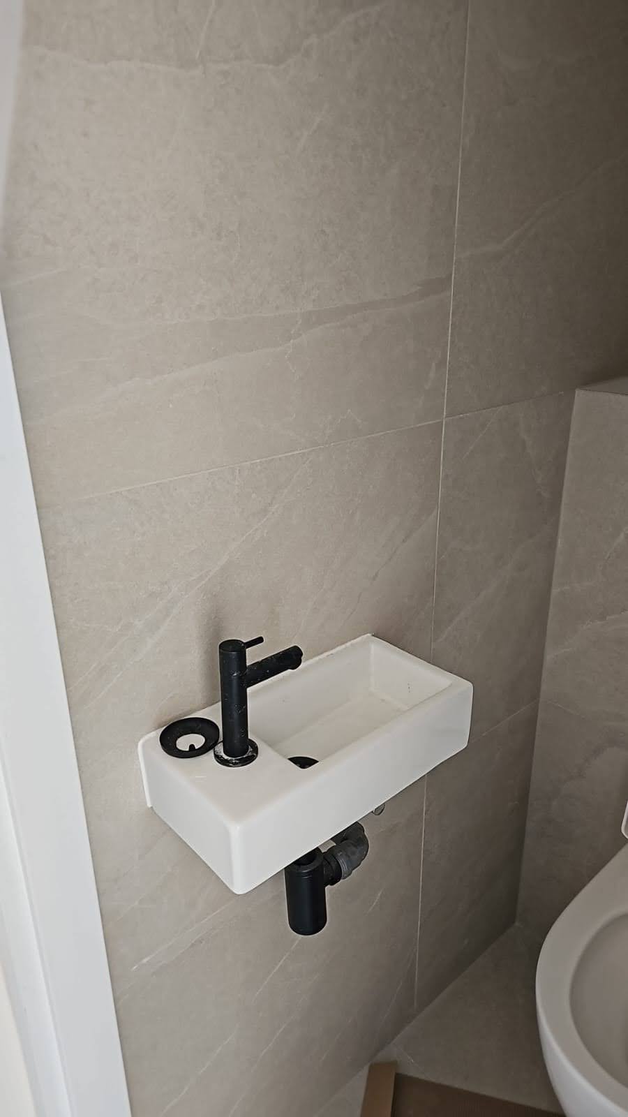 Complete bathroom renovation from scratch - plumbing connections, floor & wall tiling, full fixture installation: shower cabin, toilet and concealed cistern